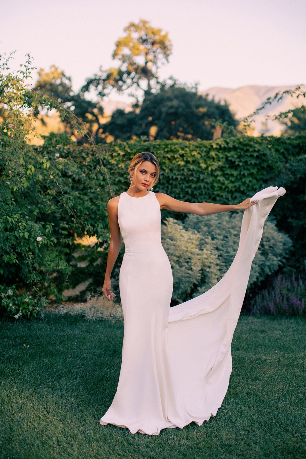 Elegant and modern, this satin wedding gown