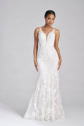 A statement in shimmer, with all over sequin lace appliques layered over sparkle tulle