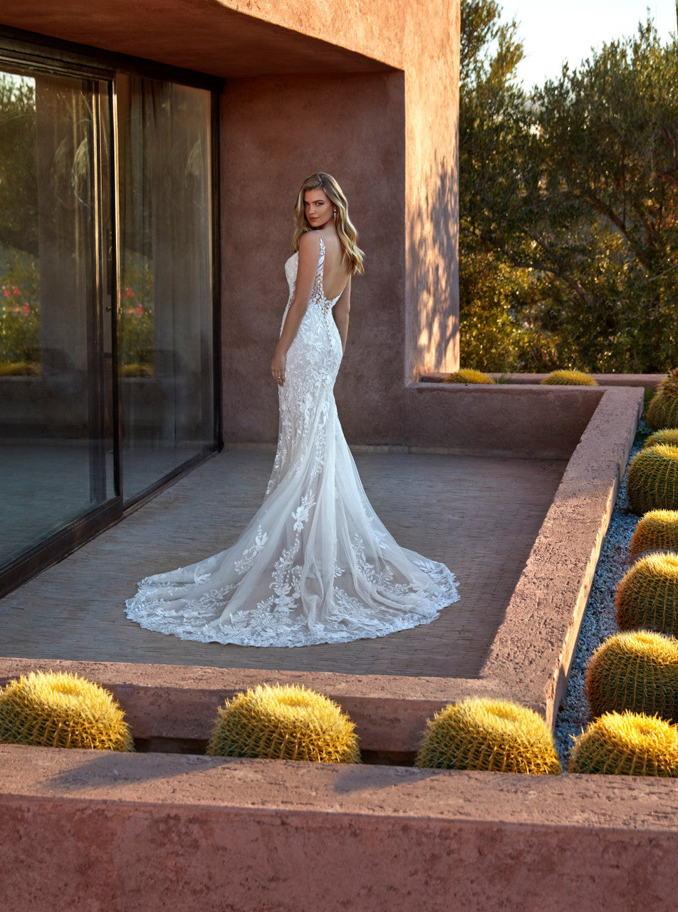 A statement in shimmer, with all over sequin lace appliques layered over sparkle tulle