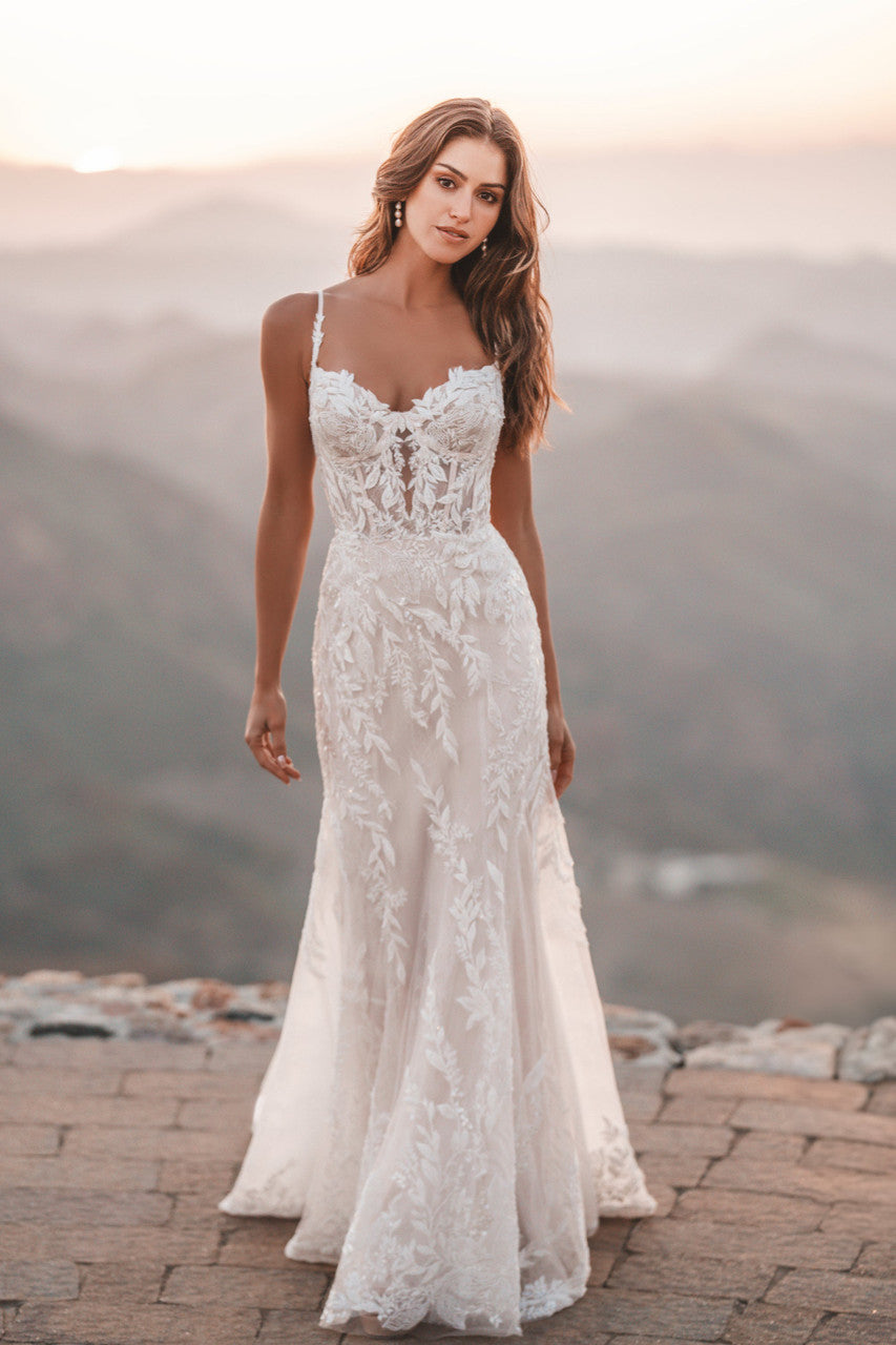 Chantilly lace and translucent tulle provides beautiful contrast to the sequined and tonal beading