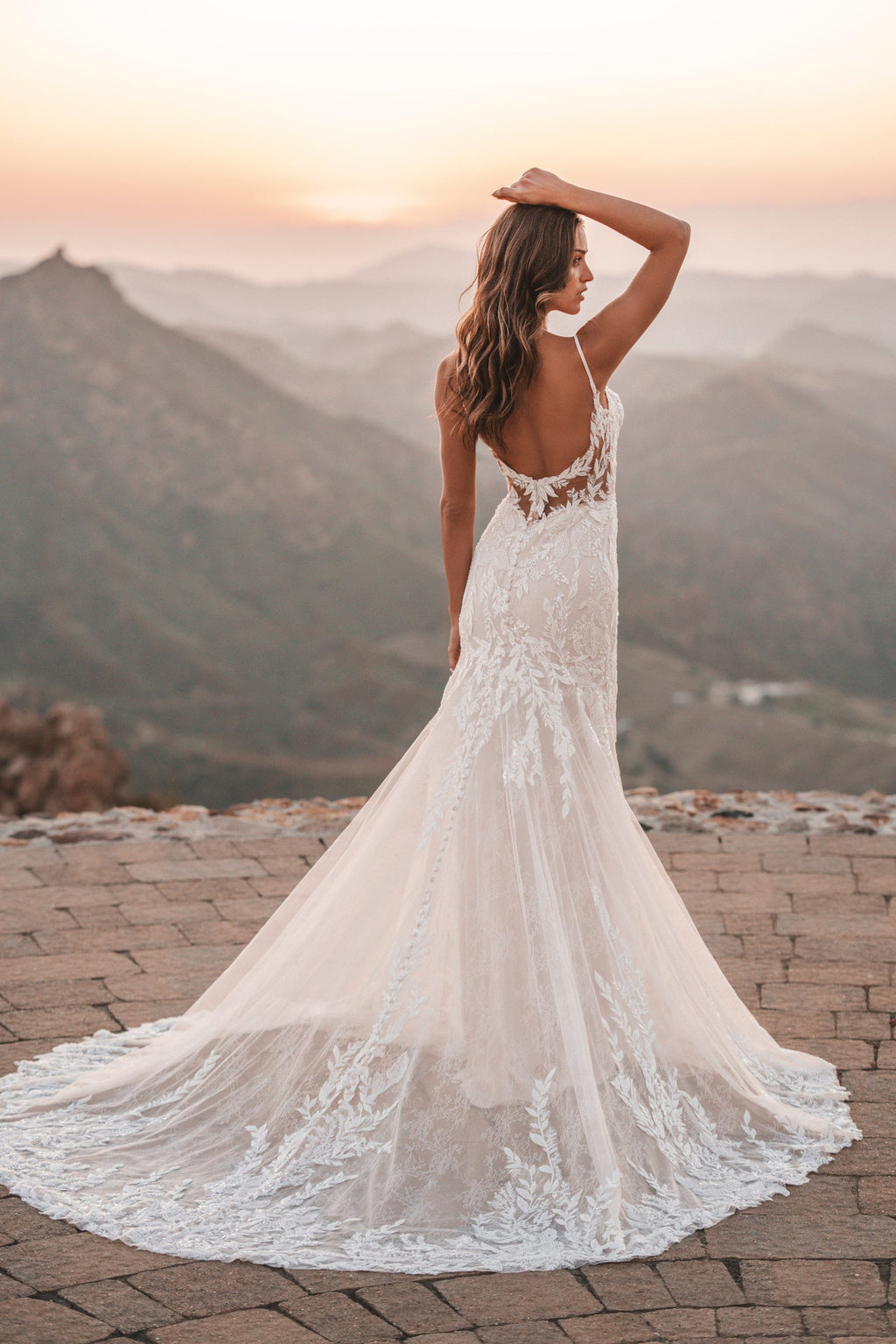 Chantilly lace and translucent tulle provides beautiful contrast to the sequined and tonal beading