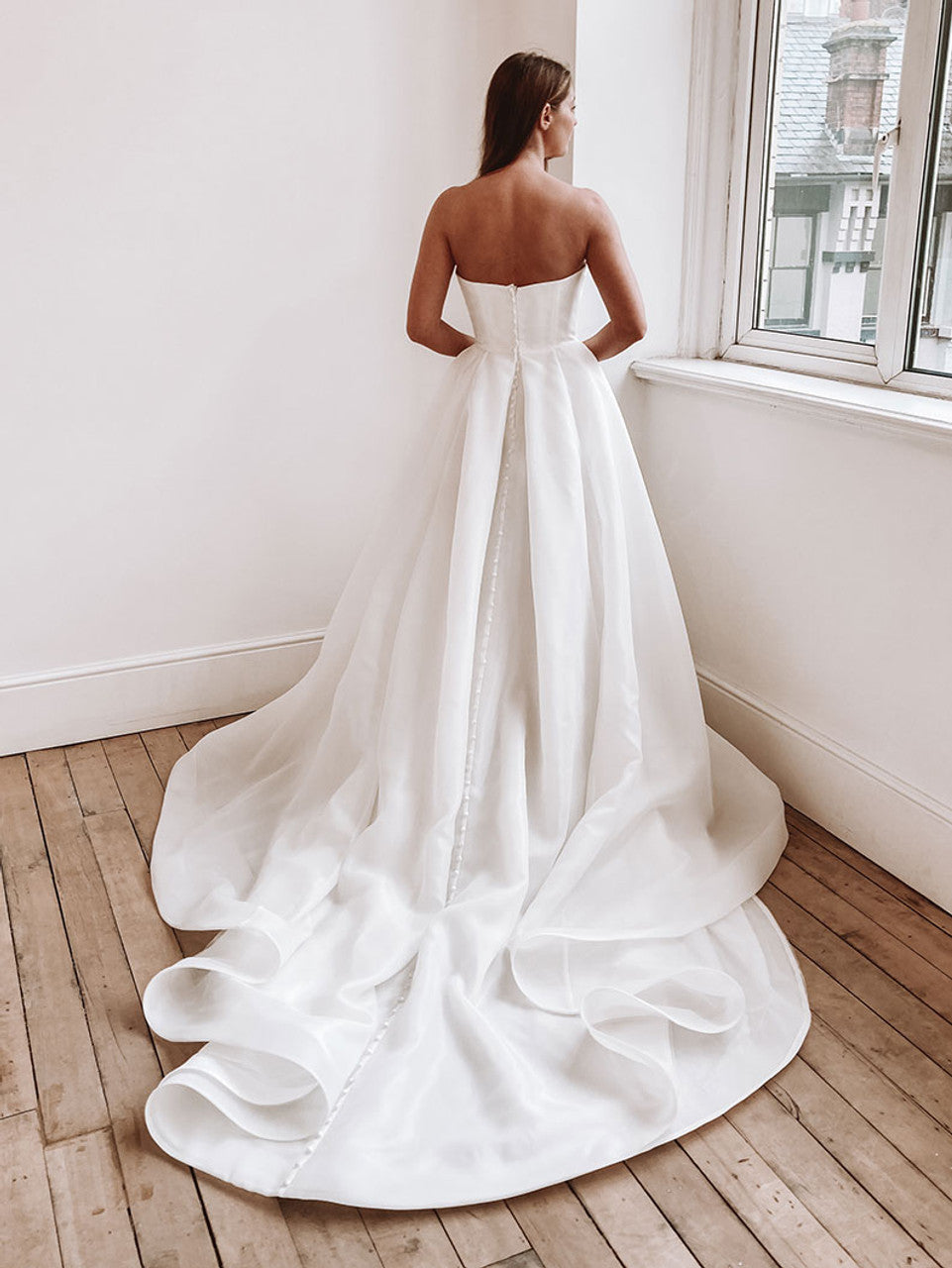Flowing chiffon ball gown featuring a romantic sweetheart neckline